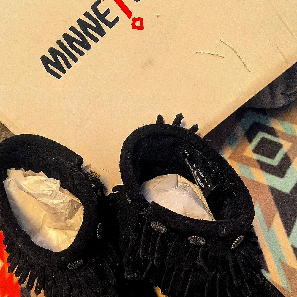 Minnetonka moccasins...new never worn